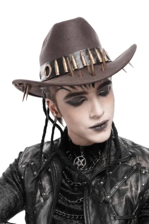 Side profile of brown gothic cowboy hat with bullet and spike details on male model wearing pentagram necklace and dark goth aesthetic