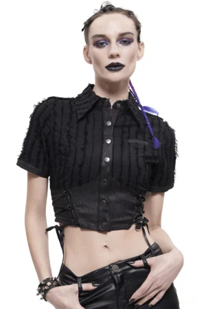 Black gothic cropped blouse with frayed stripes, lace-up waist, and metal buttons on goth model with purple braid