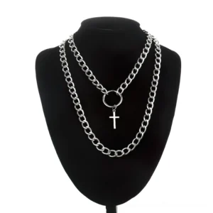 Alternative gothic cross pendant necklace with dual silver chains displayed on black jewelry bust - front mannequin display