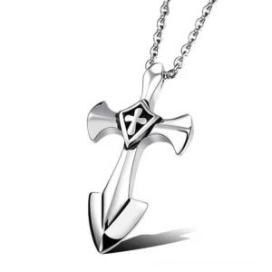 Stainless steel gothic cross pendant with hollow design on white background, front view showing polished silver finish and architectural cross motif