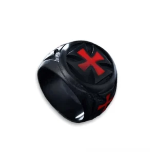 Black gothic cross signet ring top side view with red enamel cross emblem and decorative stone accent