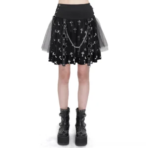 Black gothic cross print knitted skirt with white crosses - front full body view on model wearing platform boots, showcasing fitted silhouette and mesh tulle overlay