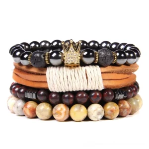Gothic multi-strand charm bracelet set with natural stone beads, vintage leather accents, and ornate crown charm, featuring mixed earth-tone stones in layered design for dark aesthetic fashion