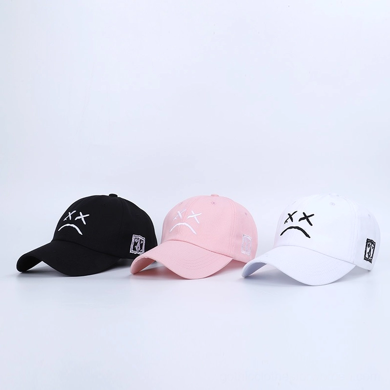 Three-piece gothic crying face baseball cap collection in black, pink and white, unisex dark aesthetic colorway showcase, sad girl style caps