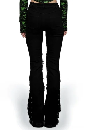 Black gothic flare denim pants back view with frayed mesh details and eyelet trim