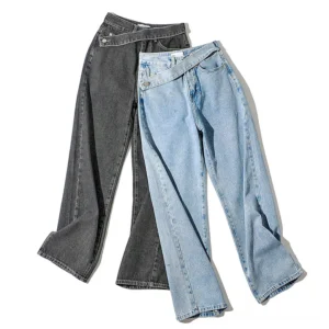 Black and light blue gothic denim jeans comparison flat lay showing asymmetric waistband design on both pairs