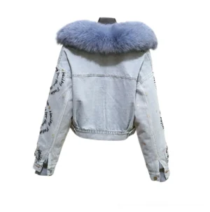 Gothic denim parka back view showing light blue fur collar, letter print sleeves, and side slit cuffs