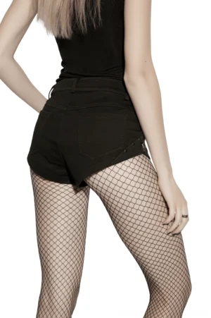 Punk denim shorts rear three-quarter view showing skull stud decorations and cutout mesh side panels