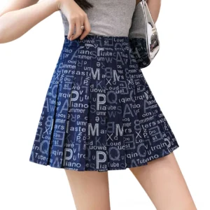 Navy blue typographic pleated mini skirt side view on model, demonstrating knife-pleated silhouette and mini length