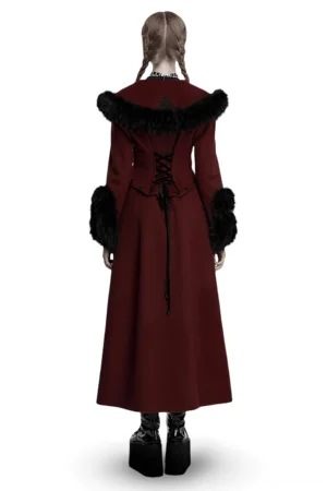 Back view of gothic wool coat displaying lace-up corset detail, split long hem, and black faux fur trims on wine red suede