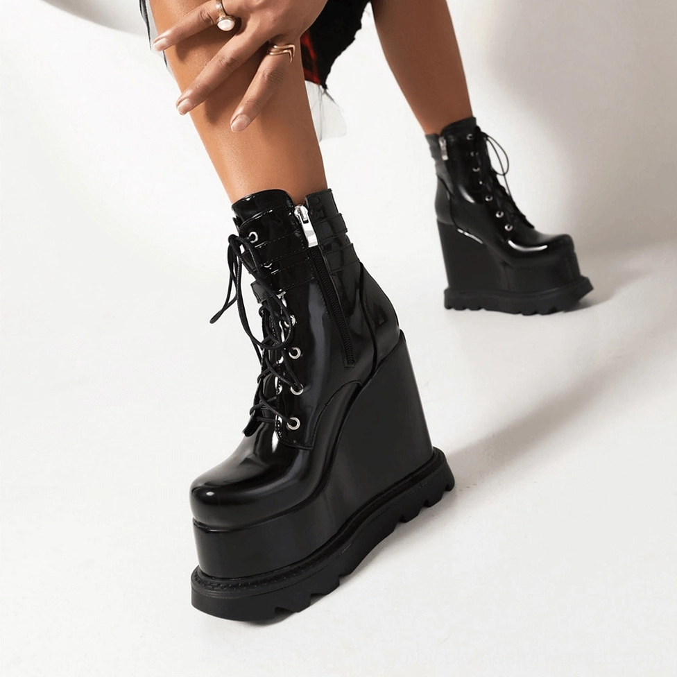 Black dragon embroidered gothic platform wedge boots worn styling reference photograph