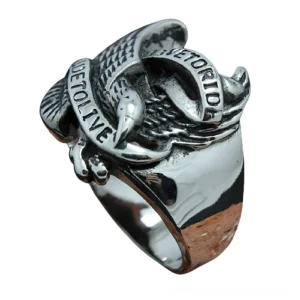 Vintage-inspired carved eagle biker ring in polished stainless steel, side profile showcasing band depth and metal luster