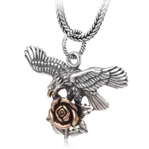 Gothic silver eagle and rose pendant necklace featuring intricate carved feather details and two-tone metal design on white background