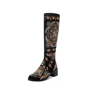 Black gothic embroidered knee-high boots with thick block heels, side profile view showcasing intricate colorful ethnic embroidery on genuine suede