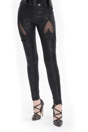 Black gothic embroidered leggings with beaded lace appliqué and mesh thigh cutouts, front three-quarter view on model