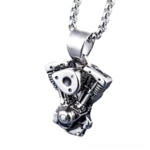 Overhead oblique view of gothic biker engine pendant displaying detailed mechanical structure and textured surface craftsmanship