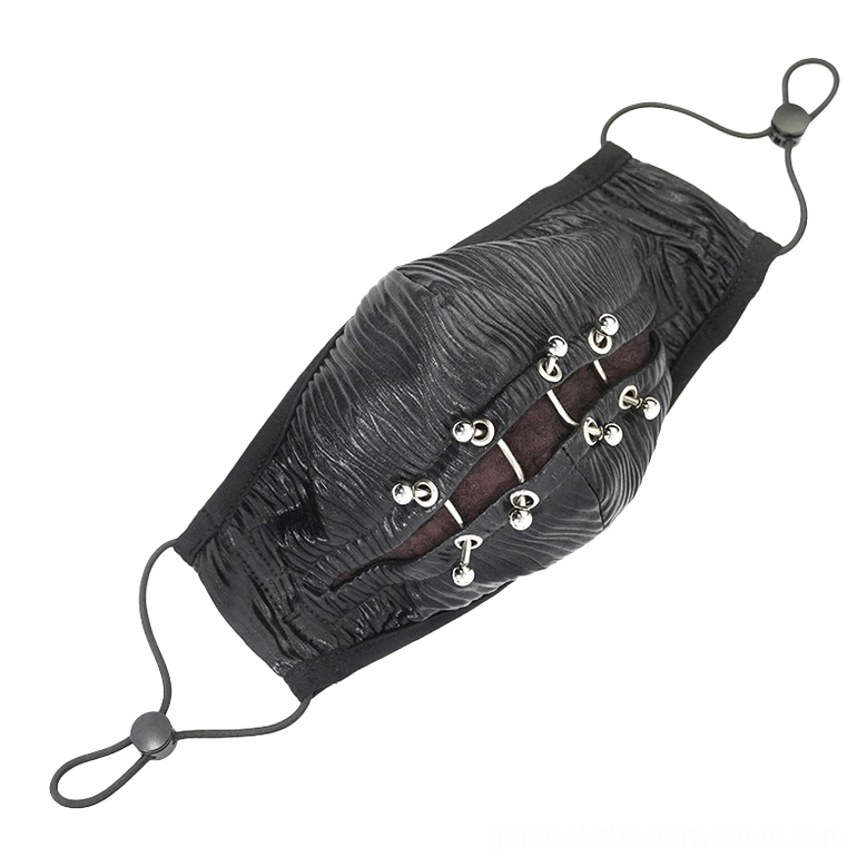 Left side profile of black gothic face mask displaying adjustable elastic ear loops and metal piercing trim accents on pure white background