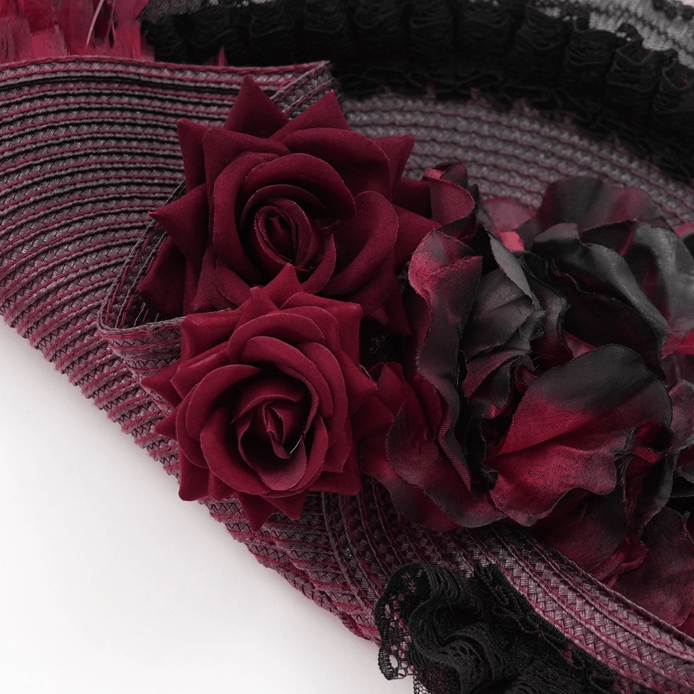 Burgundy black gothic fascinator shown with theatrical makeup and dark aesthetic personal styling for alternative fashion statement