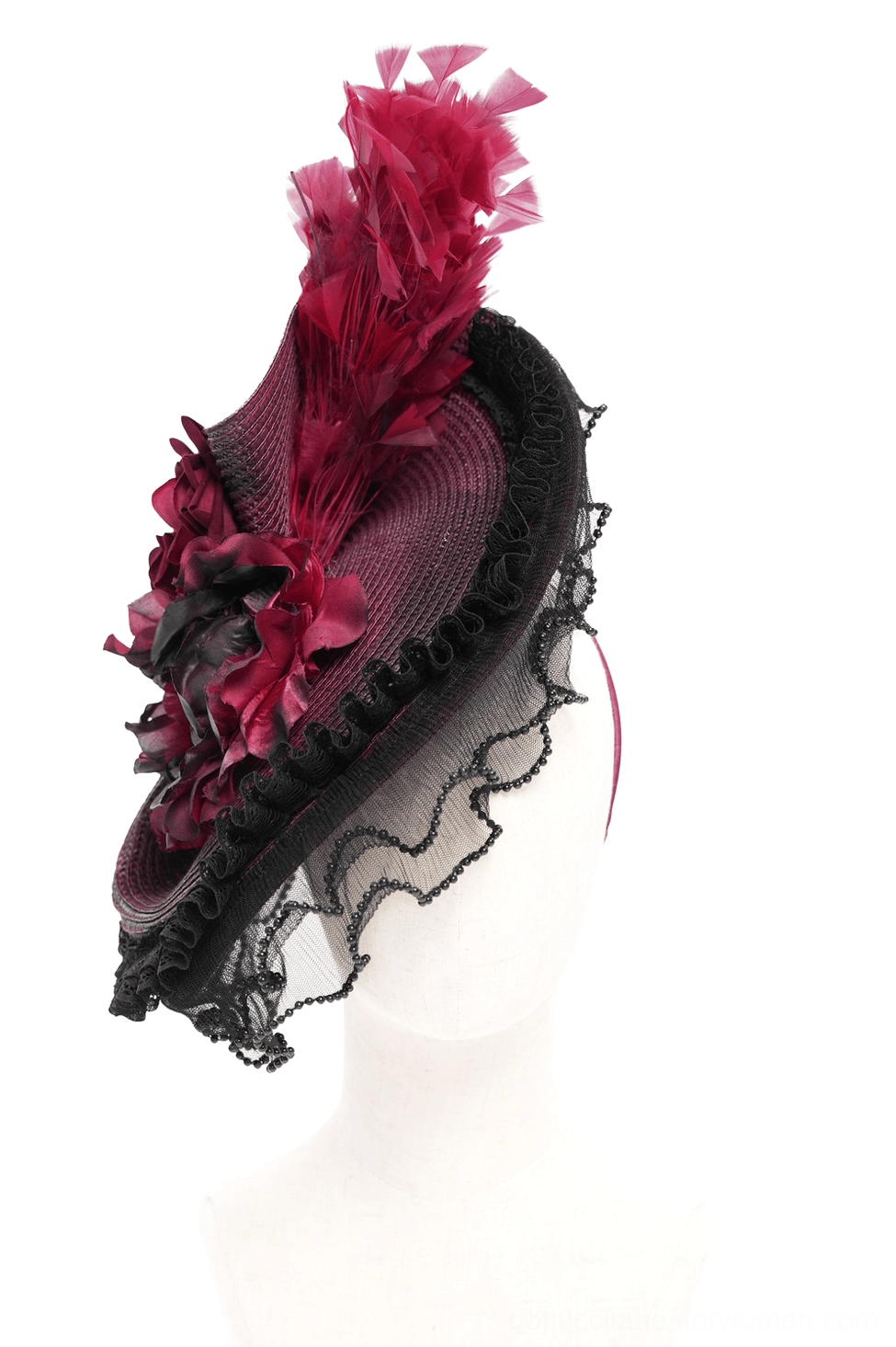 Plain mannequin head displaying left side view of burgundy black fascinator with woven fabric base, black lace trim, and floral feather accents