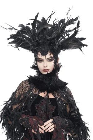 Gothic black feather crown headdress on model, front view, worn with fur-trimmed cape and sequined mesh overlay, studio setting