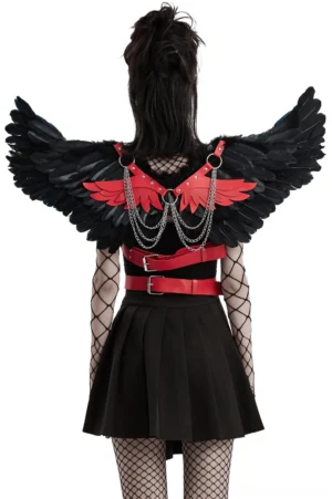 Gothic demon feather wing harness with red leather straps and silver chains worn from behind, showing full wingspan and back harness detail