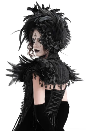 Back view of gothic feathered cape on female model showing rear design with lace-up corset gown coordination