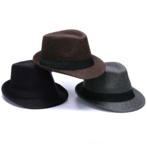 Three gothic fedora hats in black, brown, and gray with speckled wool felt fabric and black ribbon bands displayed in flat lay arrangement