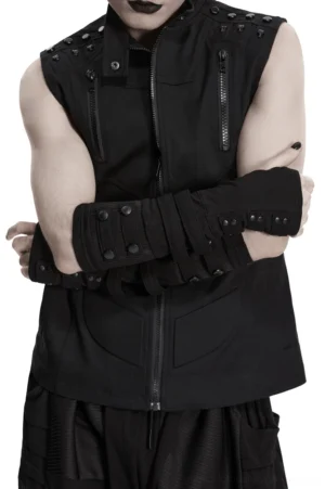 Black gothic fingerless gloves styled with zippered vest, model wearing dark alternative fashion ensemble demonstrating layering potential