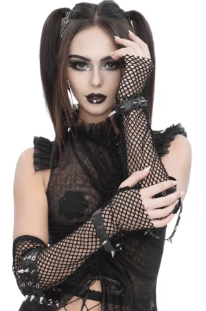 Black fishnet gothic arm gloves with spiked buckle straps worn by model with gothic makeup and twin ponytails, front view