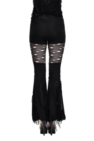 Black gothic flared trousers with studded fishnet panels - back view on model