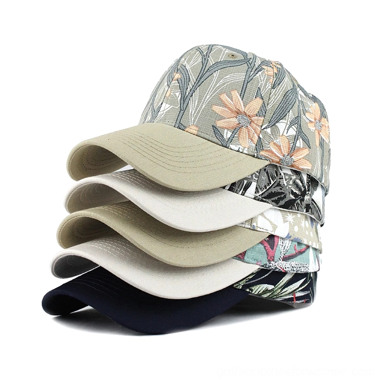 Five stacked gothic floral baseball caps showing multiple dark botanical print colorways and designs