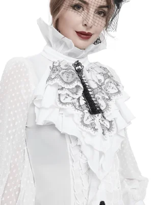 Gothic floral jabot necktie worn by model, front three-quarter view showing white base with black embroidery and layered ruffles