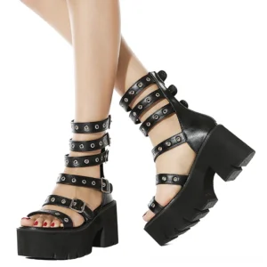 Black gothic gladiator platform sandals with multi-buckle straps and metal hardware, side oblique view showcasing open toe design and chunky block heel