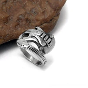 Antiqued silver guitar open ring side front view, weathered vintage finish, textured guitar silhouette design, Gothic music aesthetic