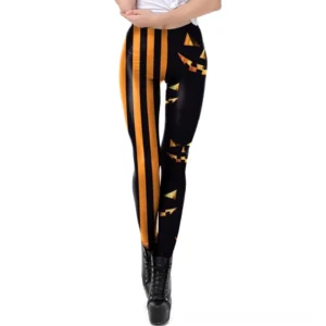 Gothic pumpkin print leggings in black with bright orange stripes, front view on model wearing mid-rise fitted silhouette