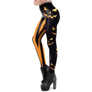 Black gothic leggings with orange pumpkin print and vertical stripes, rear side view showing shiny stretch fabric and jack-o-lantern designs