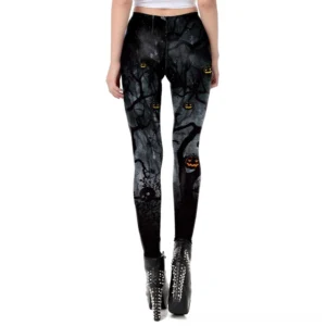 Women's gothic halloween leggings with spooky bare tree and jack-o-lantern print, high-waisted fit, rear view on model