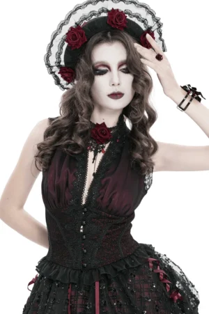 Front view of black wine red halter corset top with plunging neckline and floral lace shoulder detail on female model