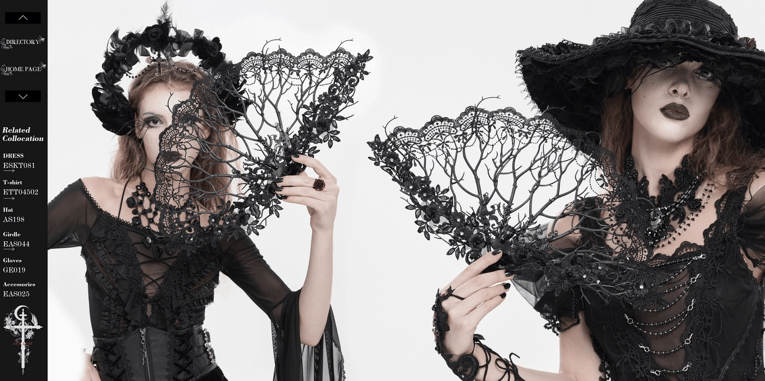 Close-up view of black gothic hand fan lace pattern and floral branch skeleton framework with refined details