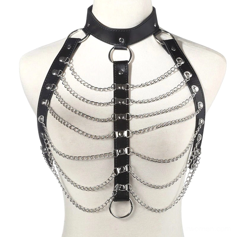 Black leather and silver chain harness displayed on white mannequin showing central vertical strap design