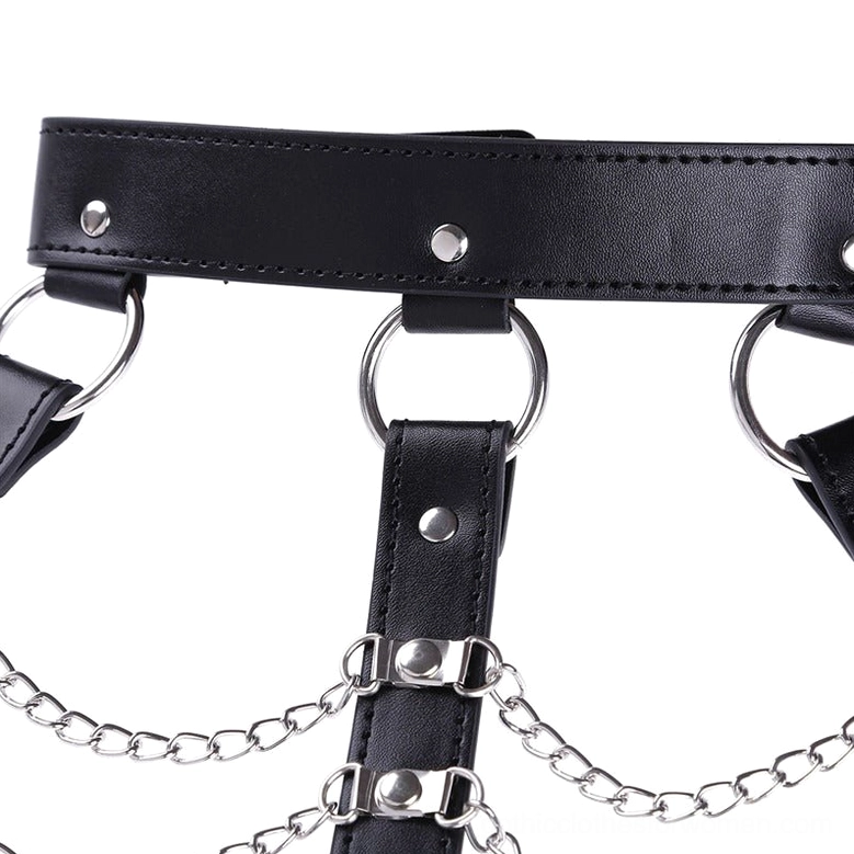 Detailed view of black leather and silver chain construction in gothic chest harness with metal hardware focus