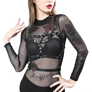 Gothic chest harness worn over sheer mesh high-neck top with adjustable strappy details
