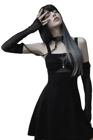 Gothic fishnet harness choker and arm sleeves styled elegantly on model paired with black slip dress, side three-quarter angle demonstrating styling versatility