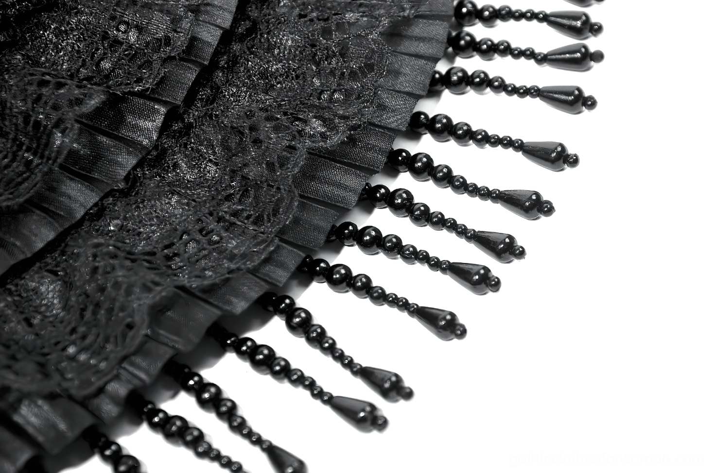 Detailed close-up of beaded tassel fringe trim - black lace and satin ruffled edge with individual beads