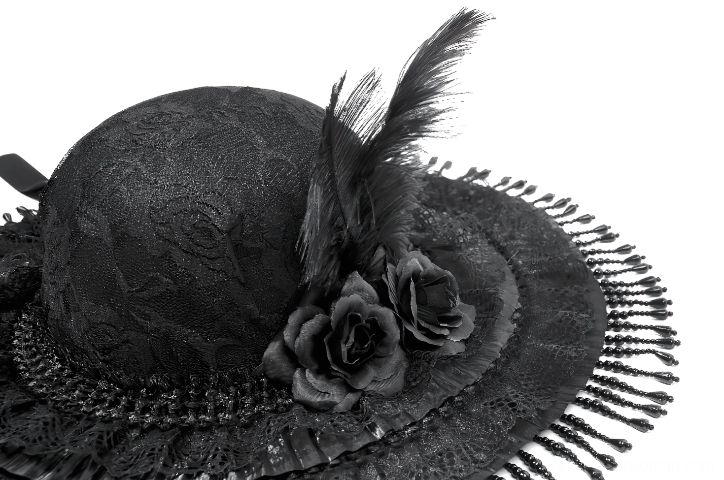 Close-up side view of gothic hat featuring black feather and velvet rose crown accent with beaded fringe