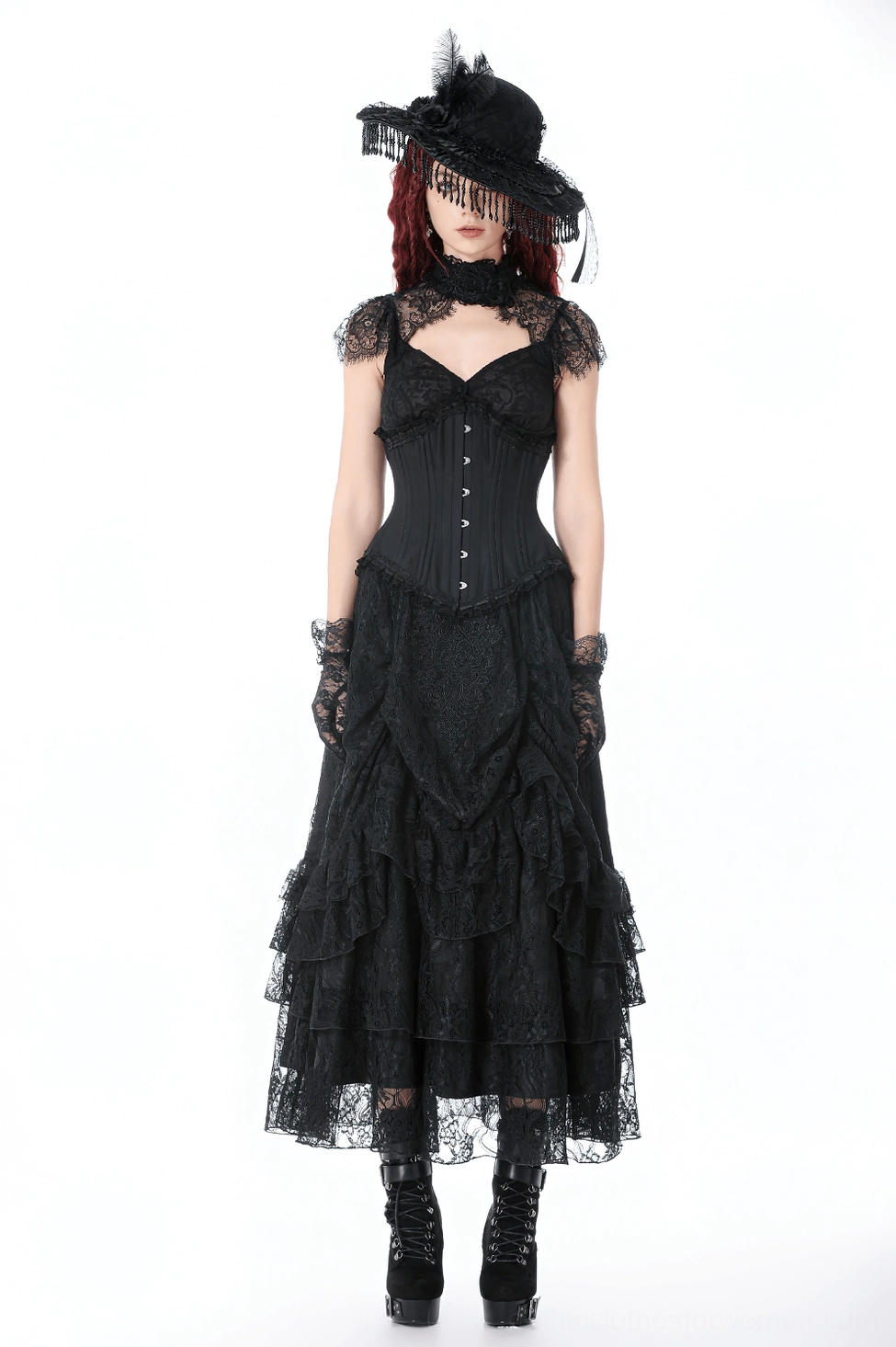 Black gothic hat detail showing satin ribbon construction and beaded fringe draping