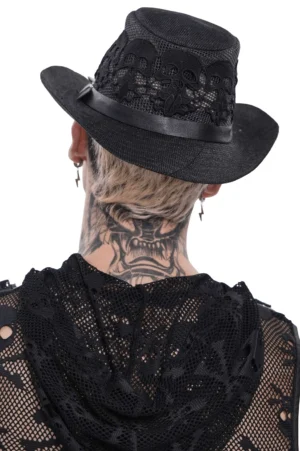 Black gothic spike trim hat back view on male model showing intricate skeleton lace mesh design