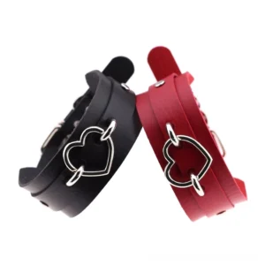 Black and red gothic heart leather choker necklace with hollow metal heart pendant, angled top view showcase