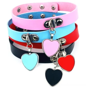 Multi-color PU leather heart chokers collection displayed in flat lay, showcasing color variety and metal snap buckles