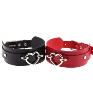 Double-layer gothic heart choker flat lay display with adjustable buckle closure, overhead composition